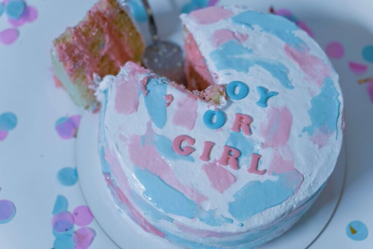 Stunning Pink and Blue Gender Reveal Cake with Buttercream Frosting and Sprinkles
